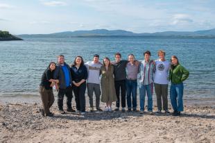 A group of IDCORE Researchers at the beach