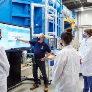 Students being instructed on the Swansea University Wind Tunnel