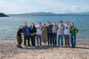 Group of ten researchers at the beach in Oban