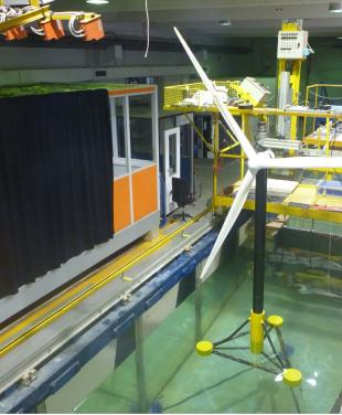 A model offshore wind turbine in a wave tank research facility